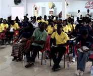 Dr. Augustina Dede Agor and Kojo Fraiku Clement with a cross-section of participating UPSA Developers Hub members during the educational engagement at AT Ghana.