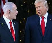 (FILES) US President Donald Trump (R) greets Israeli Prime Minister Benjamin Netanyahu (L) upon arrival at Trumps Mar-a-Lago residence in Palm Beach, Florida, on December 29, 2025. -  Jim Watson, AFP
