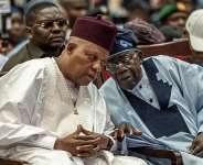 Nigerian President Bola Tinubu (R), seeking re-election, is widely considered the countrys shrewdest political dealmaker. -  Light Oriye Tamunotonye / AFP