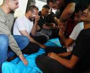 Relatives of Palestinian teenager Karim Shalaldeh, 17, cry over his body at a hospital in the West Bank city of Hebron, Friday, August 21, 2026. -  Mahmoud Illean, AP