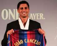 Getty ImagesImage caption: Joao Cancelo made 23 appearances on loan with Barcelona last season