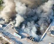 This handout photograph taken and released by the Dnipropetrovsk Regional Military Administration on August 21, 2026 shows firefighters taking part in operations against a fire at the site of a shopping mall damaged following a Russian strike in Kryvyi Rih. -  Dnipropetrovsk Regional Military Administration via AFP