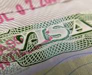This photo illustration shows a visa stamp on a foreign passport in Los Angeles on June 6, 2020. -  Chris Delmas, AFP file photo