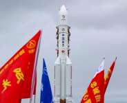In this photo released by Xinhua News Agency, the combination of the Change-7 lunar probe and the Long March-5 Y14 carrier rocket is transferred vertically to the launching area at the Wenchang Spacecraft Launch Site in southern Chinas Hainan Province on Wednesday, Aug. 19, 2026. -  Yang Guanyu, Xinhua via AP