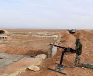 File - A member of Syrian government forces, stands guard the Abu Duhur military air base area in Idlib province, on January 21, 2018. -  George Ourfalian, AFP