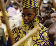 File - Ugandas King of the Tooro Kingdom, King Oyo Nyimba Kabamba Iguru Rukidi IV, during his 18th birthday at Fort Portal, Uganda on April 17, 2010 as he assumed the full duties of King of the Tooros. -  Marc Hofer, AP