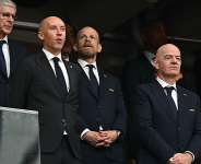 Gianni Infantino has been heavily criticised by former FIFA allies Arsene Wenger (4L) and secretary-general Mattias Grafstrom (2R) -  Paul Ellis, AFP
