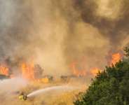 The wildfires have claimed the lives of five firefighters since last week. -  Aris Oikonomou, AFP