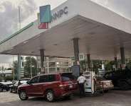 People buying fuel at a petrol station in Lagos, Nigeria, in March 2026. - AP - Sunday Alamba