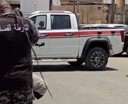 July 21st 2026, Sabha, Libya: a woman is sentenced to 100 lashes for adultery. She is seen kneeling on a mattress in the middle of a street blocked by a judicial police vehicle. One officer reads out the verdict, then another carries out the sentence.  Instagram / @feminists_of_libya -  Instagram / @feminists_of_libya
