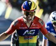 Mauritian rider Kim Le Court celebrates as she crosses the finish line to win stage six of the Tour de France Femmes. -  Nicolas Tucat, AFP