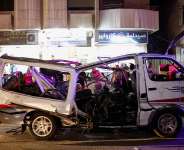 People look at a damaged vehicle following an explosion, in Jaramana, Damascus countryside, Syria, August 6, 2026 -  Reuters