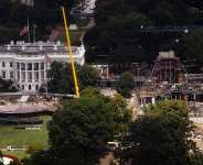 Construction work continues on a helipad and the White House Ballroom on the South Lawn of the White House on August 5, 2026, in Washington. -  Tierney L. Cross, AP