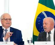 Supreme Court President Justice Edson Fachin, left, speaks alongside Brazilian President Luiz Inacio Lula da Silva during a ceremony at the Planalto Palace in Brasilia on September 4, 2026. - Eraldo Peres, AP