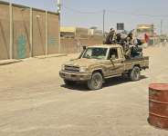 Tuareg rebels from the Azawad Liberation Front (FLA) coalition ride in the back of a pick-up truck in Kidal, Mali, on 26 April 2026. -  AFP