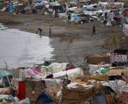 Tents stand along the Trampolin Beach following recent mass crossings of migrants from Morocco to Ceuta, Spain, September 02, 2026 -  Pedro Nunes, Reuters