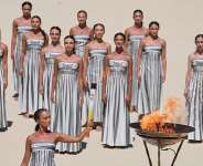 A flame was lit during the torch-passing ceremony at the Panathenaic Stadium in Athens, Greece, for the 2026 Youth Olympic Games, which start in Senegal on 31 October. - AP Photo/Petros Giannakouris - Petros Giannakouris