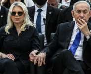 Israels Prime Minister Benjamin Netanyahu, right, and his wife Sara attend a ceremony commemorating Israels Remembrance Day for fallen soldiers, or Yom HaZikaron, at the Military Cemetery on Mount Herzl in Jerusalem, Tuesday April 21, 2026. -  Ilia Yefimovich, AP