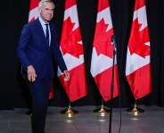 Canadian Prime Minister Mark Carney speaks to the media at a cabinet retreat in Banff, Alberta, Thursday, Sept. 10, 2026. - Jeff McIntosh/The Canadian Press via AP