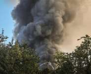 Firefighters work at a site of a Russian drone strike in Kyiv, Ukraine on September 16, 2026. - Alina Smutko, Reuters
