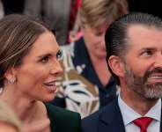 Donald Trump Jr. and his partner Bettina Anderson sit on the day US President Donald Trump delivers remarks to US embassy personnel and business leaders at Deerfield Residence, in Dublin, Ireland on September 12, 2026. - Kylie Cooper, Reuters