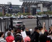 Pro-Palestinian protesters demonstrate near the venue of pop star Ed Sheerans concert after rapper Macklemore was cut from the musical lineup over his free Palestine remarks on stage criticizing Israeli government actions in Gaza and the West Bank, near Lincoln Financial Field in Philadelphia, Pennsylvania, US, September, 19, 2026. - Eduardo Munoz, Reuters