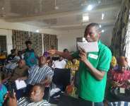 The Director of ORGIIS, Mr. Julius Awaregya, making inputs at clean energy forum in Paga of the Kassena-Nankana West District