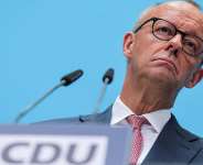 Germanys Merz vows to hold ruling coalition together after election gains by far right, hard left