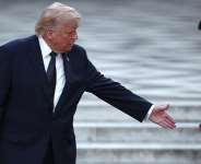 FILE - US President Donald Trump and Frances President Emmanuel Macron at Chteau de Versailles ahead of a dinner to celebrate the 250th anniversary of the independence of the United States, in Versailles on June 17, 2026. - Guillaume Baptiste, AFP