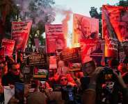 Young political and civil society activists take part in a protest in Tunisia in December 2025. - REUTERS - Jihed Abidellaoui