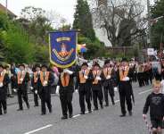 The Portadown District Loyal Orange Lodge return from the Demonstration Field along the Hamiltonsbawn Road in Armagh during the County Armagh 12th July parades 2009. -  Wikimedia commons