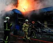 Firefighters work at the site of an apartment building, Ukraine, September 26, 2026 - Gleb Garanich, Reuters