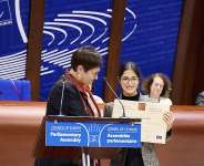 Mehraveh Khandan Heris accepts the Vaclav Havel Human Rights Prize on behalf of her mother, Iranian lawyer Nasrin Sotoudeh, during a ceremony at the Council of Europe in Strasbourg, France, 28 September, 2026. - AFP - HANDOUT