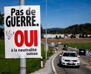 An poster that reads No war, Yes to Swiss neutrality, in favour of a referendum to enshrine neutrality in Switzerlands constitution, on a road in Epagny, 25 September 2026. The proposal was rejected by over 70 percent of voters on Sunday. -  Jean-Christophe Bott/Keystone via AP