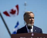 Canadian Prime Minister Mark Carney said he suspended trade talks with the Trump administration after unfair terms were proposed. -  Andrej Ivanov, AFP