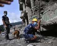 Police rescue workers search for survivors in the aftermath of flash floods at Trishuli in Nepals Nuwakot district on September 7, 2026 - Pedro Pardo, AFP