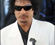 Col Gaddafi seems to have a fresh outfit for every occasion