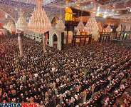 A scene of of people mourning inside tomb of Hazrat Imam Husain at Karbala