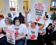 A protest at the US Capitol last year against the Trump administrations cuts to HIV/AIDS funding.  By CHIP SOMODEVILLA (GETTY IMAGES NORTH AMERICA/AFP/File)