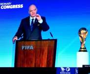 A speech by FIFA president Gianni Infantino is broadcast on a screen in Saudis capital Riyadh as the Gulf kingdom is confirmed as 2034 World Cup host.  By - (AFP)