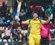 Australian batter Matt Renshaw celebrates his second international century in Harare, almost 10 years after his first. By Jekesai NJIKIZANA (AFP)