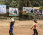 Billboards in Bamenda of Pope Leo XIV and Cameroonian President Paul Biya.  By PATRICK MEINHARDT (AFP)
