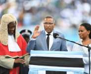 Botswana€s new president Duma Boko (C) was sworn in, a week after his landslide election victory.  By Monirul Bhuiyan (AFP)
