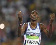 Britains Mo Farah celebrates winning the Mens 5000m Final at Rio 2016 Olympic Games.  By Fabrice COFFRINI (AFP)
