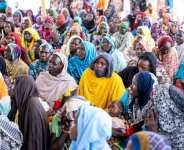 Chadian returnees met with an International Organization for Migration (IOM) delegation in Tongori.  By Joris Bolomey (AFP)