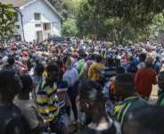 Crowds queued outside the Burundi embassy on Monday.  By SIMON MAINA (AFP)