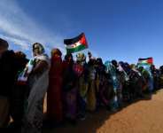 Displaced Sahrawis arrive at a Polisario congress at the refugee camp of Dakhla on January 13, 2023.  By Ryad KRAMDI (AFP)