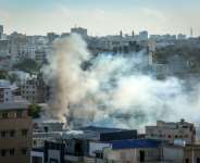 Heavy gunfire shook Somalias capital overnight and smoke rose over the city on Thursday.  By - (AFP)