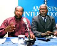 Liberated slave Jouma Ould Meissara (L) and Boubacar Ould Messaoud at a press conference.  By Seyllou (AFP/File)