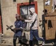 Mobs have gone door-to-door to demand that foreign nationals leave South Africa.  By MZINGENKOSI SIBANDA (AFP)